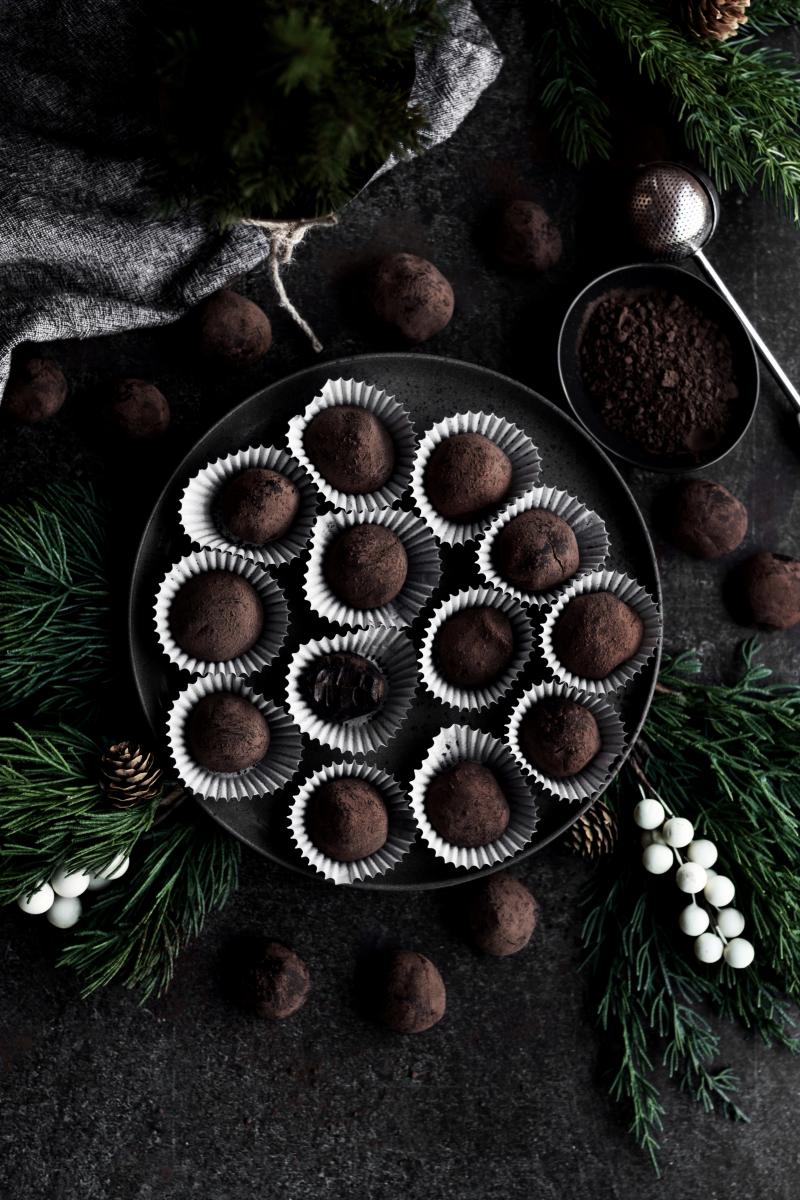 Chocolate Truffles arranged on a plate in cupcake wrappers for easy grabbing.