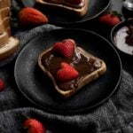 Nut Free Chocolate Spread on toast with strawberries cut like hearts.