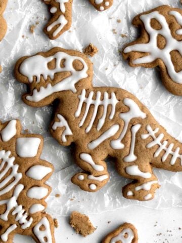 A gluten free tyrannosaurus cookie with icing for bones.