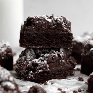 Two buttery, dark and delicious Chocolate Crumb Cakes stacked on top of each other.