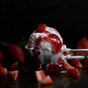 Gluten free Strawberry Ice Cream in a scoop.