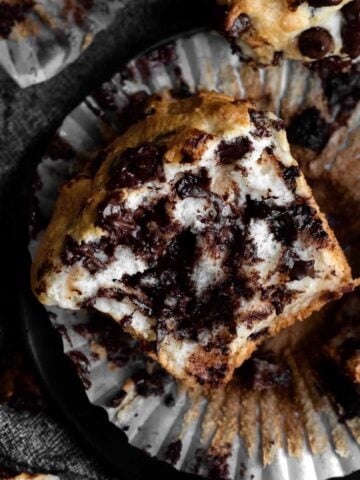 An insane amount of chocolate chips inside Bakery-Style Chocolate Chip Muffins.
