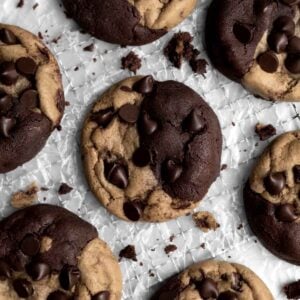 Brookie Cookies sit two-faced on parchment paper, ready to be enjoyed.
