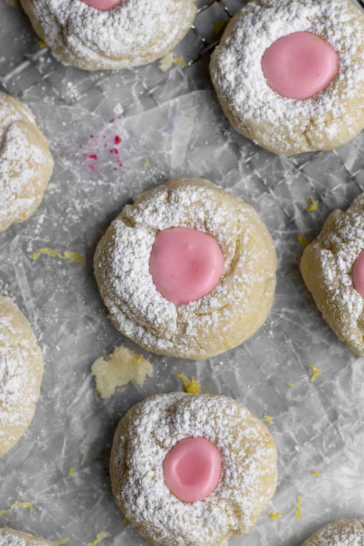 A closer look at the pink raspberry icing center of the cookie.