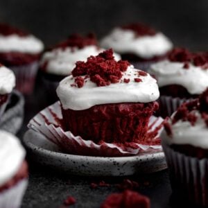 A gluten free Red Velvet Cupcake with the wrapper down.