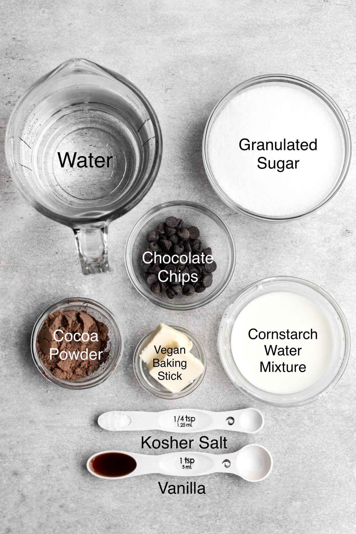 The ingredients of the pudding in separate containers.