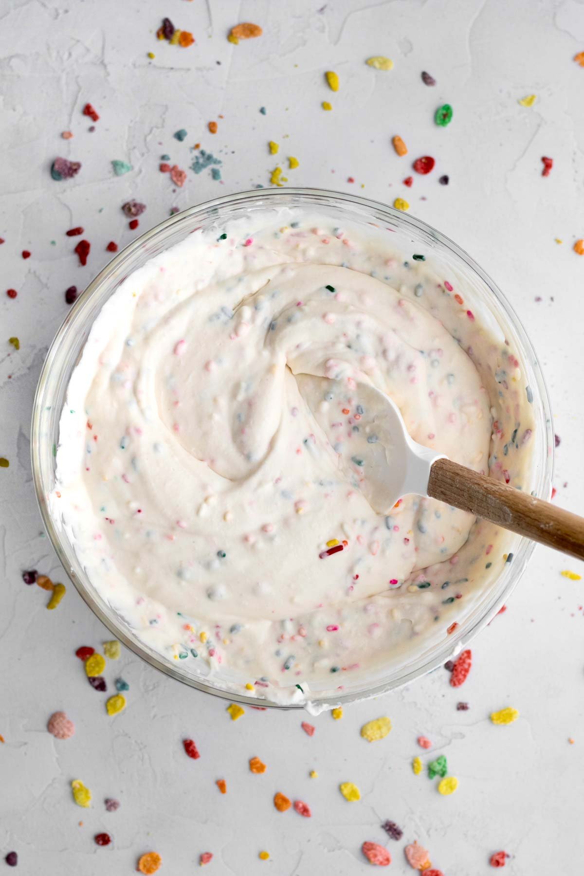 Mixing the sprinkles thouroughly.