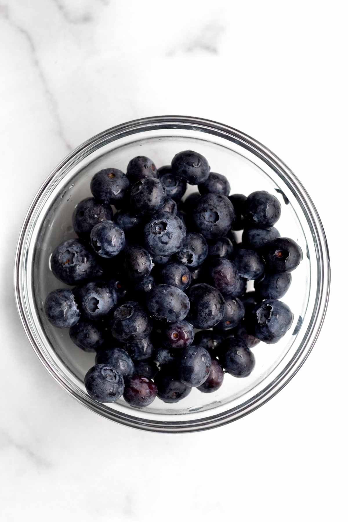Bowl of a lot of blueberries.