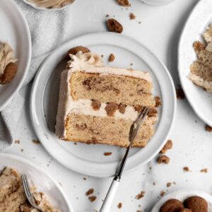 Patches of cinnamon sugar dot this slice of Snickerdoodle layer cake.