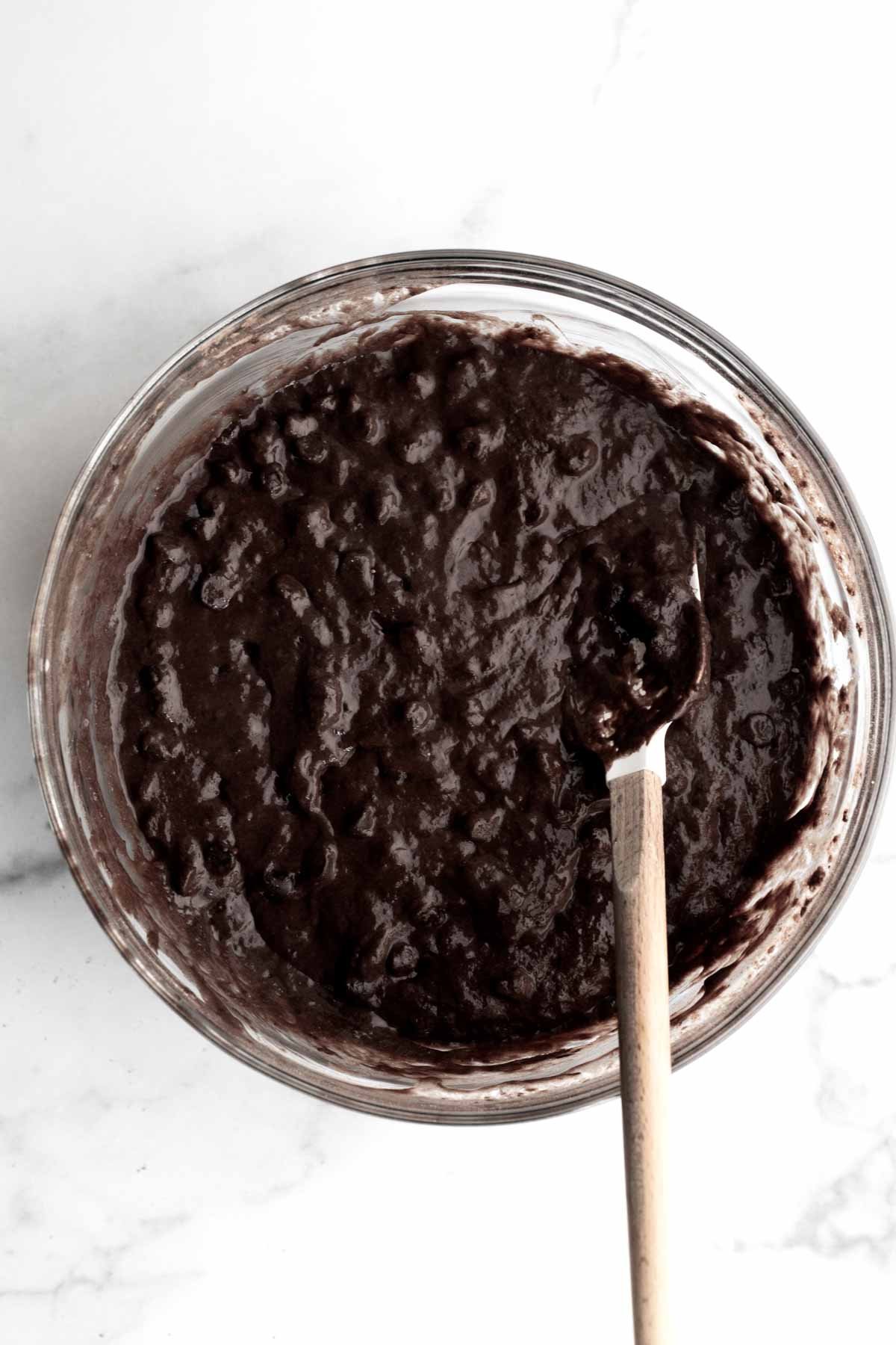 The chocolate chips are mixed thoroughly in the batter.