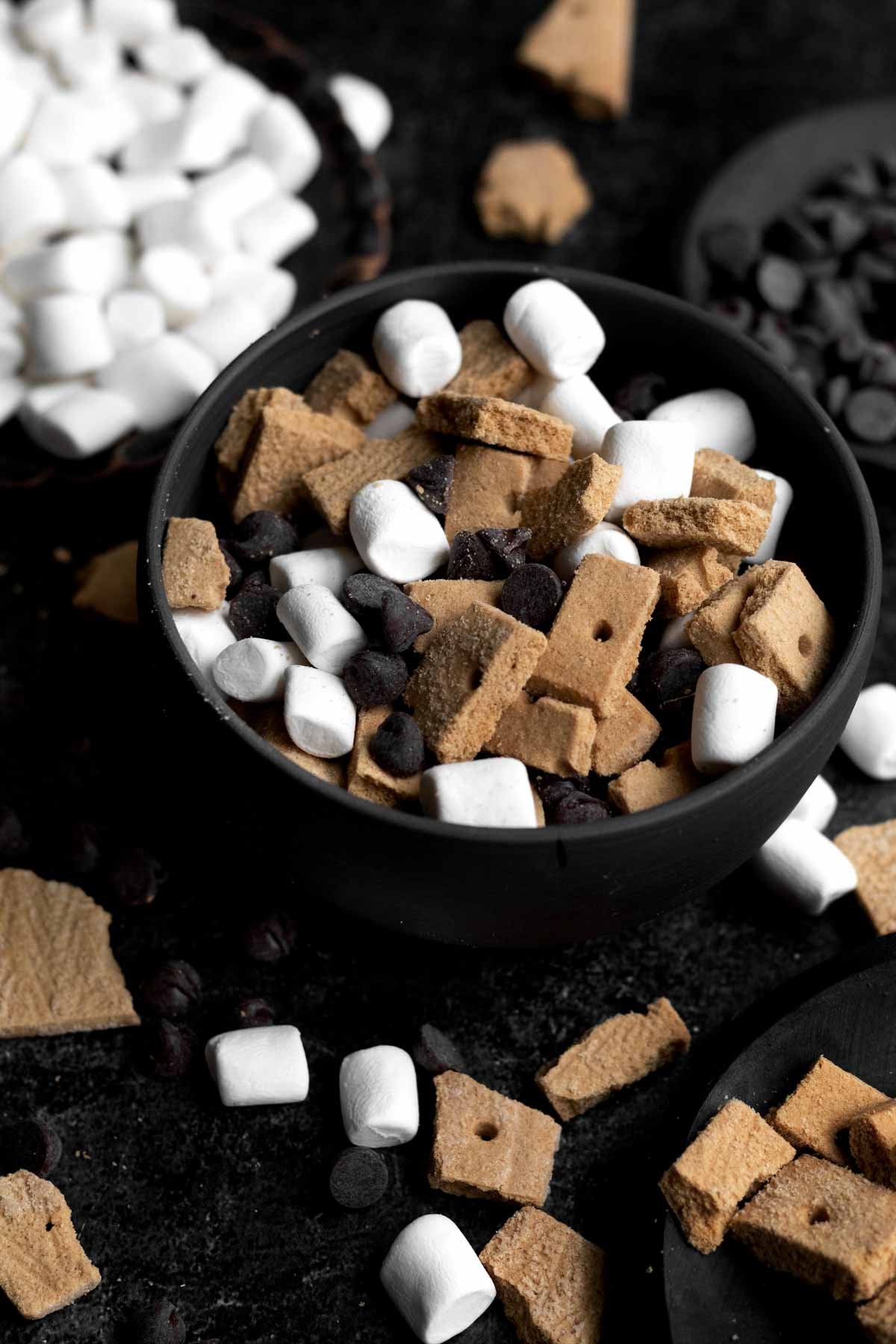 A black bowl of S'mores Snack Mix.