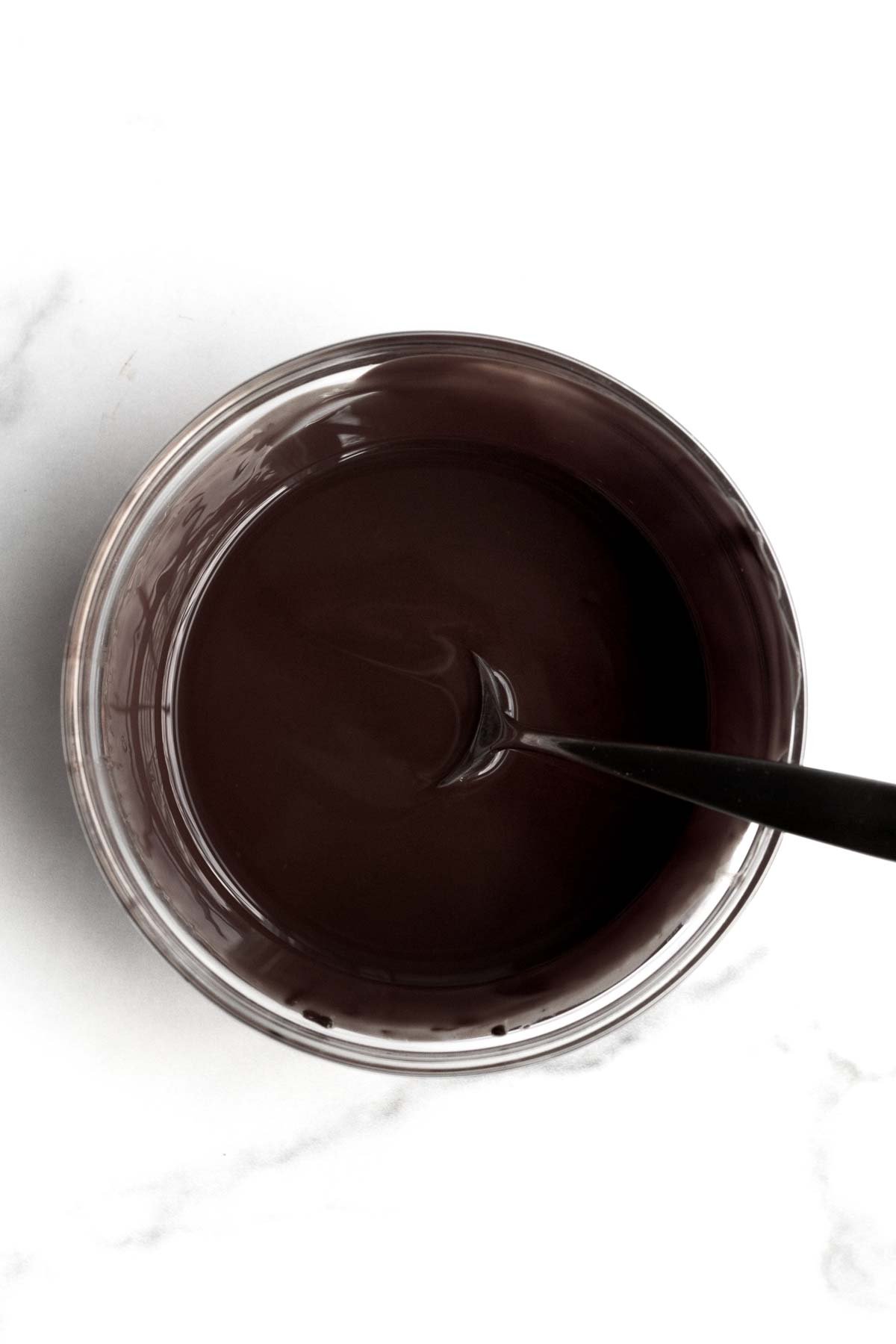 Silky smooth liquid chocolate in a bowl.