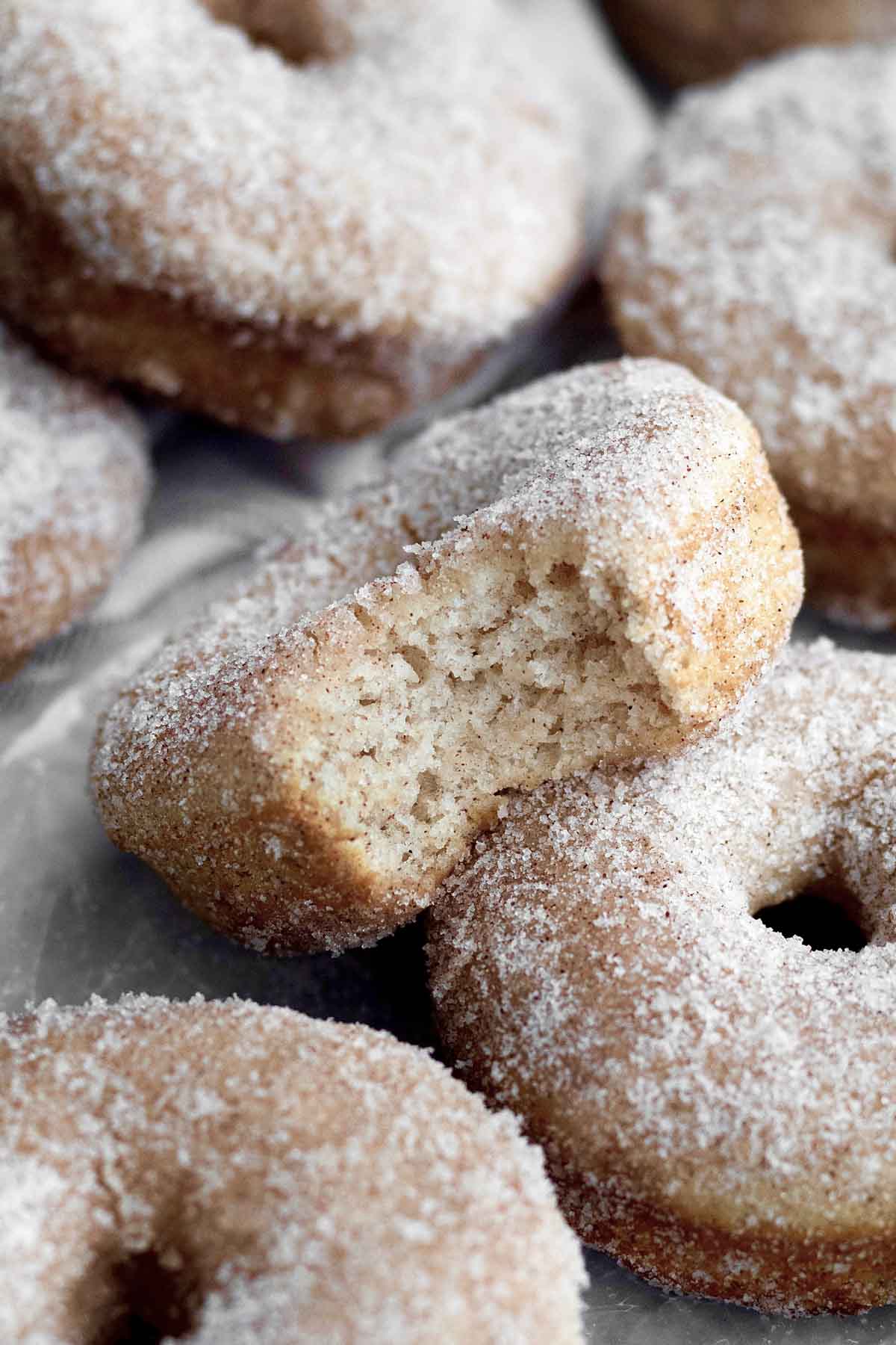 A look at the granulated sugar and cinnamon on the donuts.