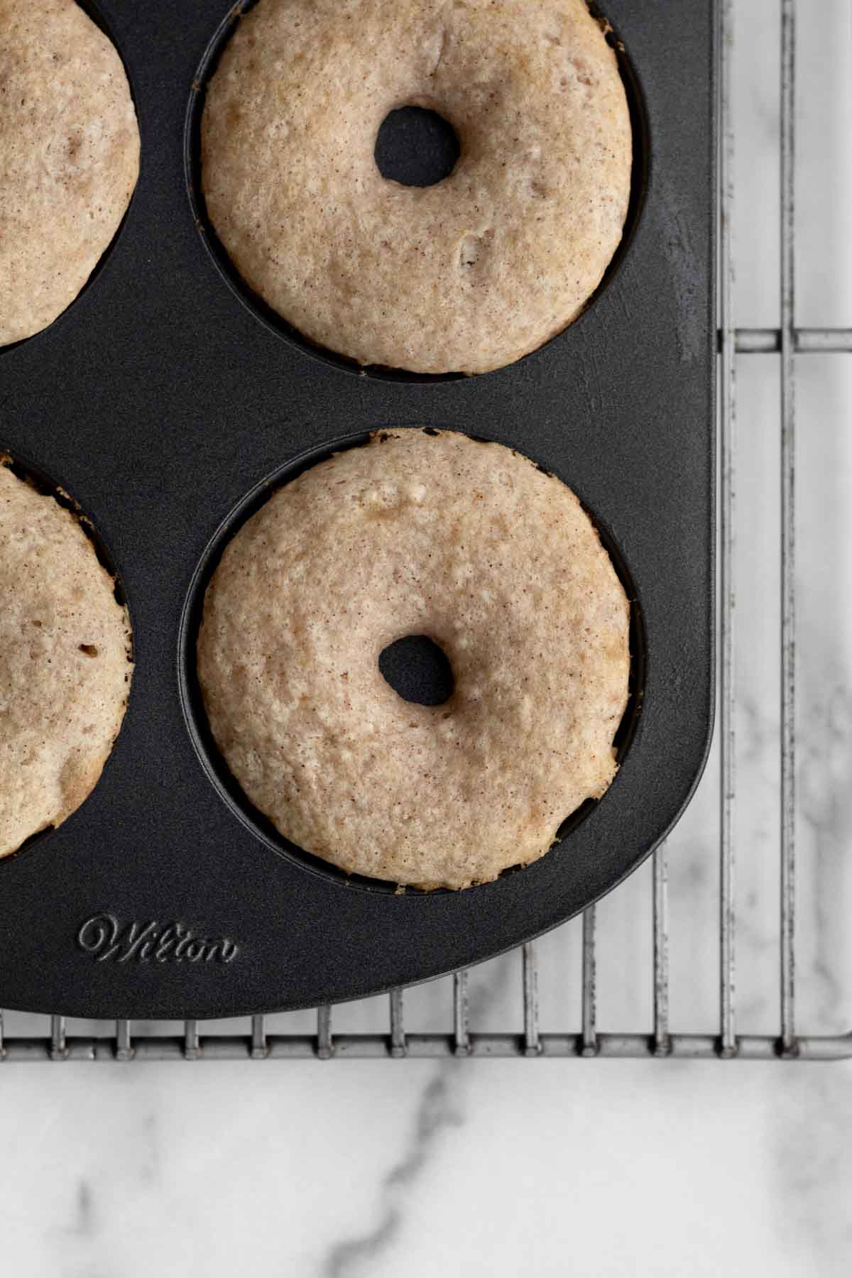 Baked donuts in the pan.