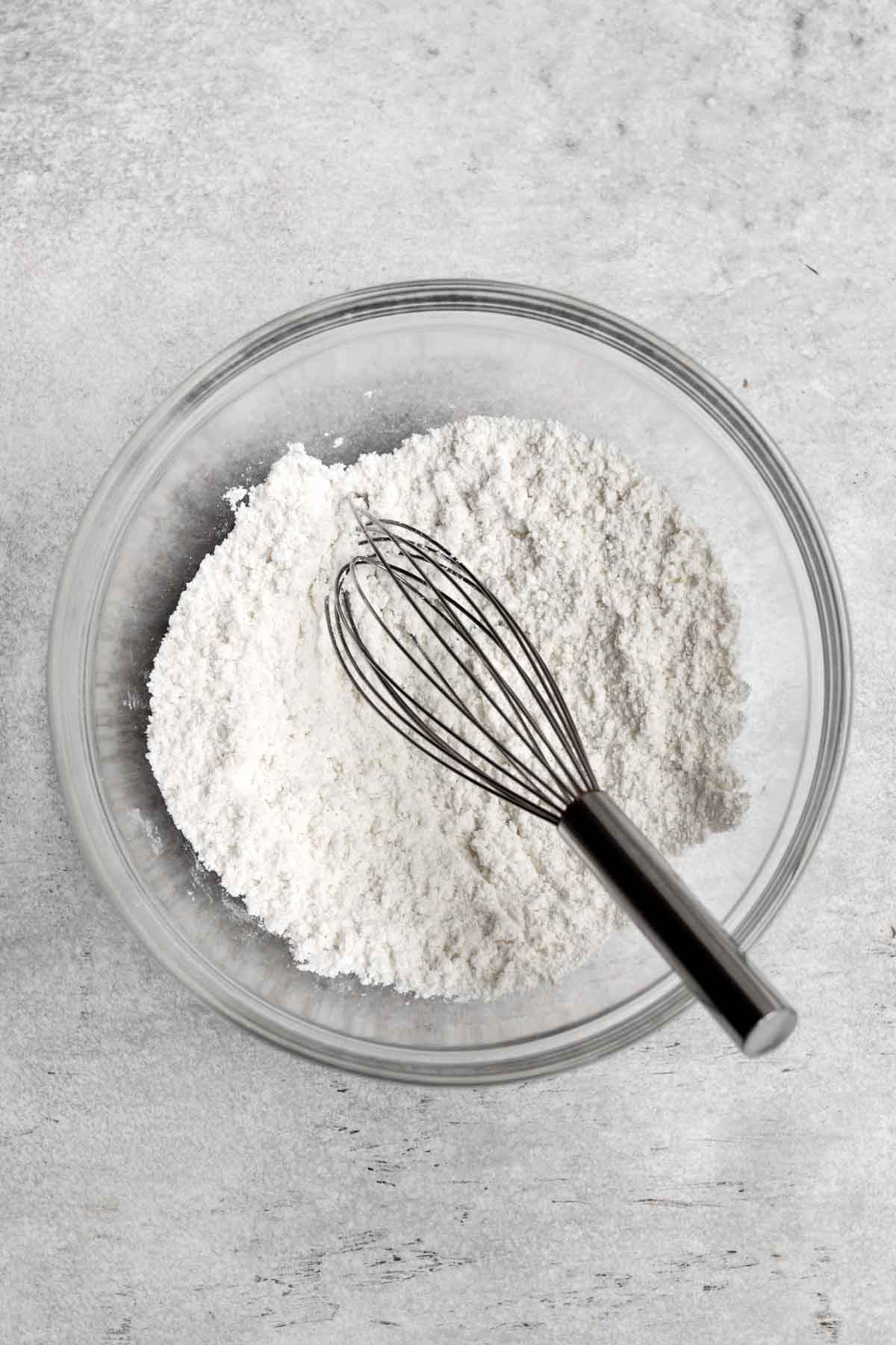 A bowl with the whisked dry ingredients.