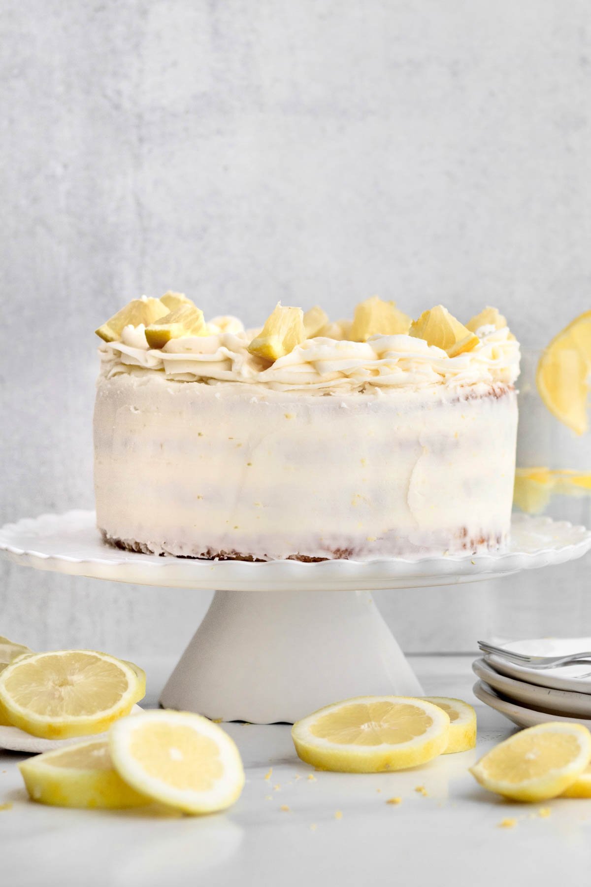 A finished Gluten Free Lemon Cake on a cake stand.