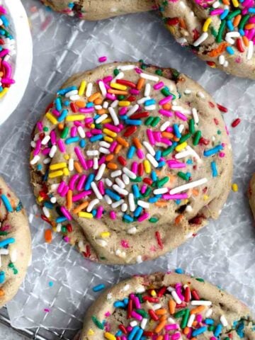 A Funfetti Cookie with a bite taken out.