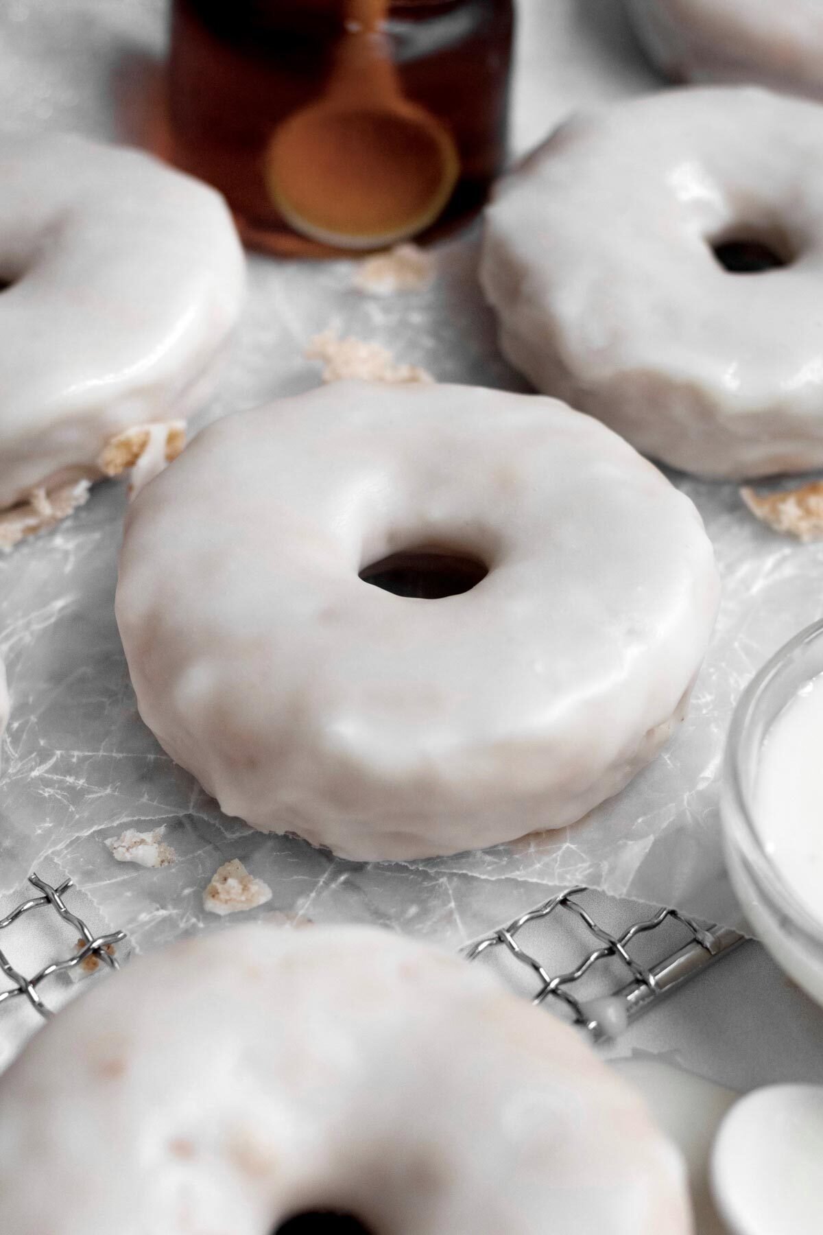 White glaze completely covers these donuts.