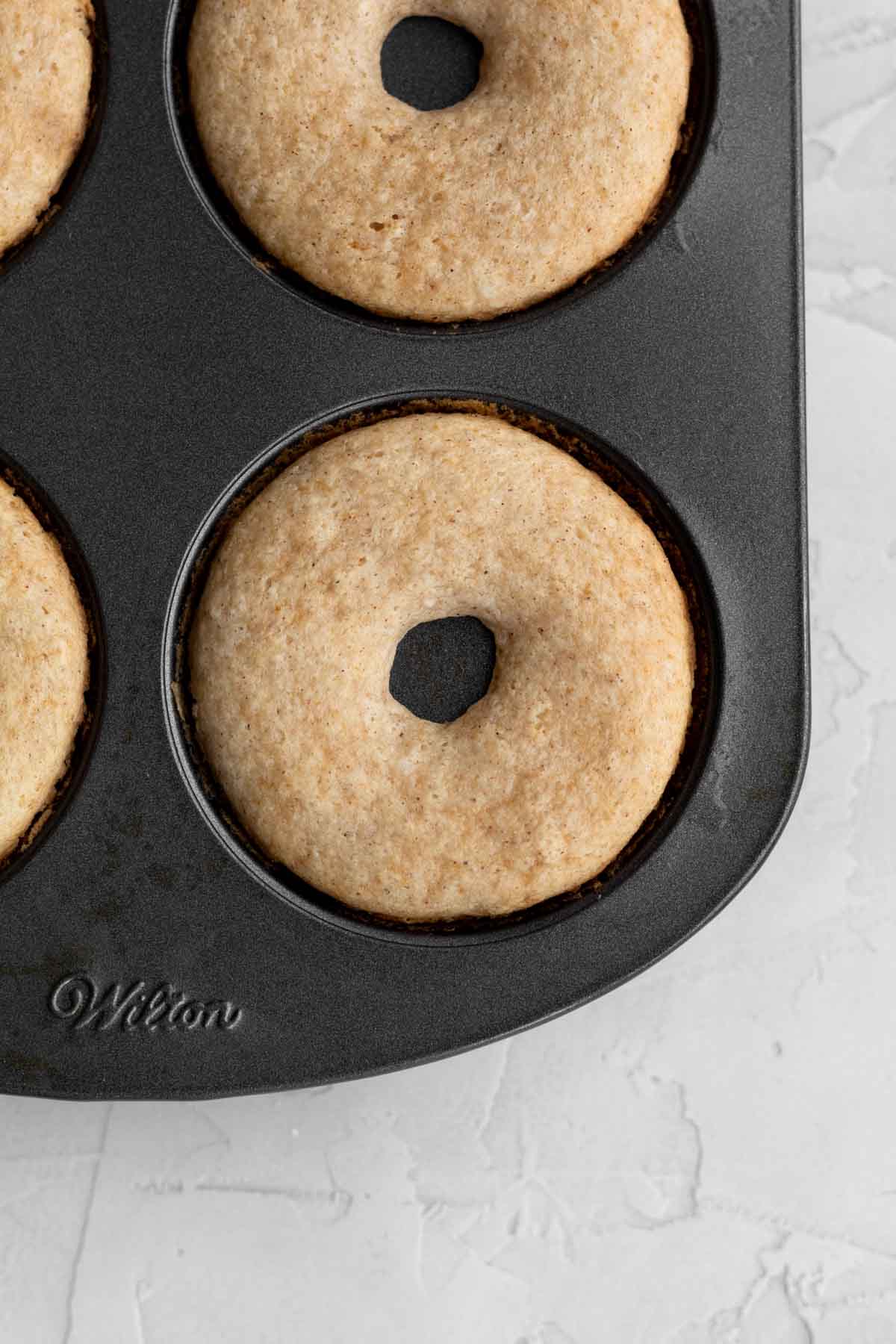 Golden brown baked donuts.