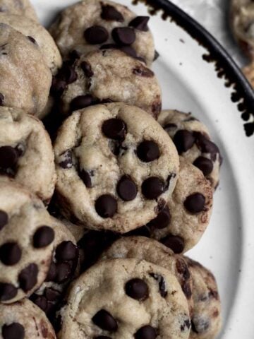 A plate of gluten free mini chocolate chip cookies.