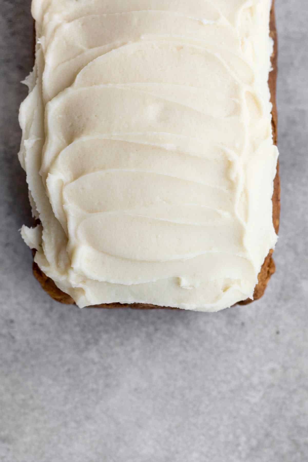 Frosting on top of the bread.
