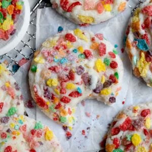 Fruity Pebbles Cookies with a bite taken out.