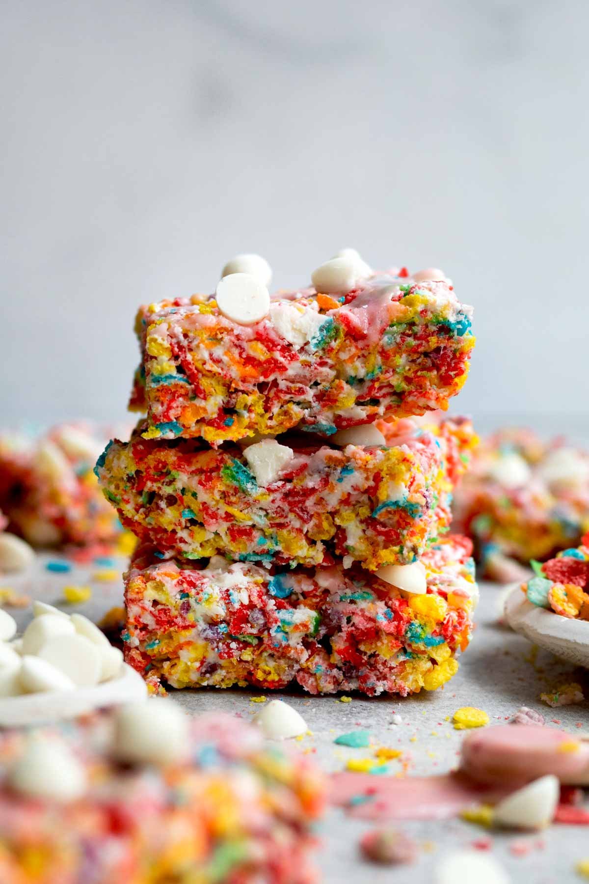 A stack of three delicious gluten free Fruity Pebbles Treats.