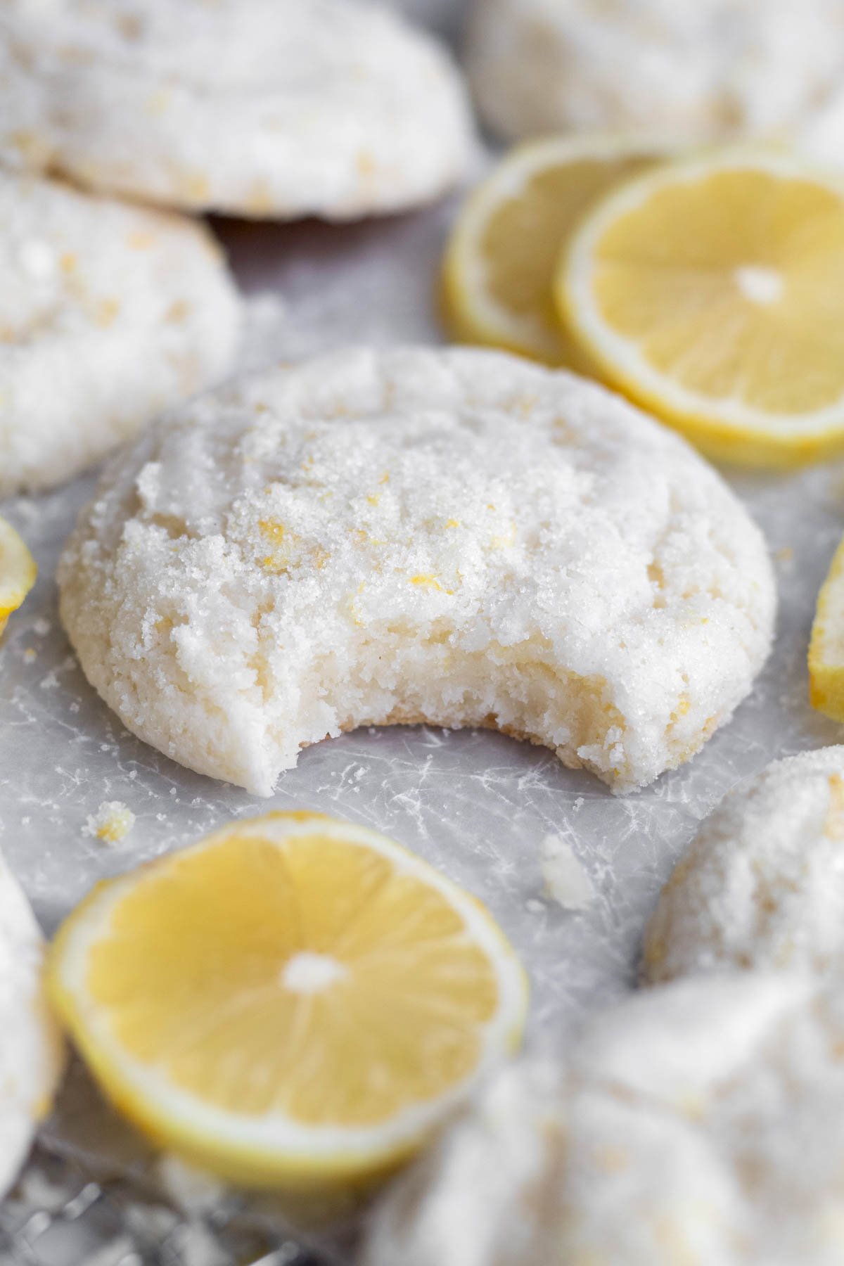 The soft interior of the cookie is encased in a crisp outside of sugary lemon zest.