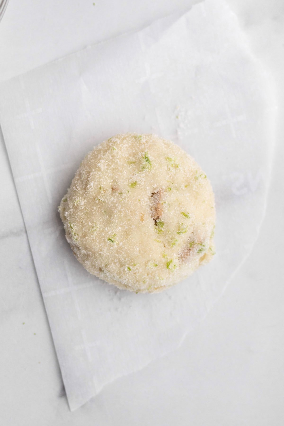 The dough covered in key lime zest infused granulated sugar.