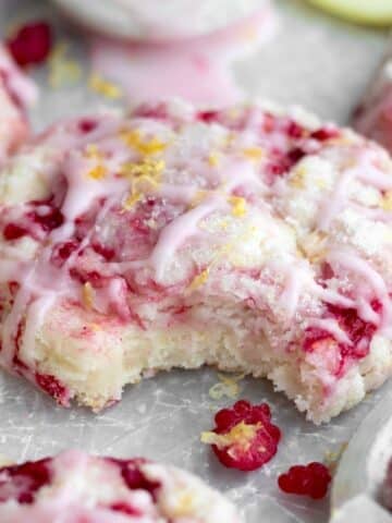 A Perfect Bite taken from this soft Lemon Raspberry Cookie with raspberry glaze.