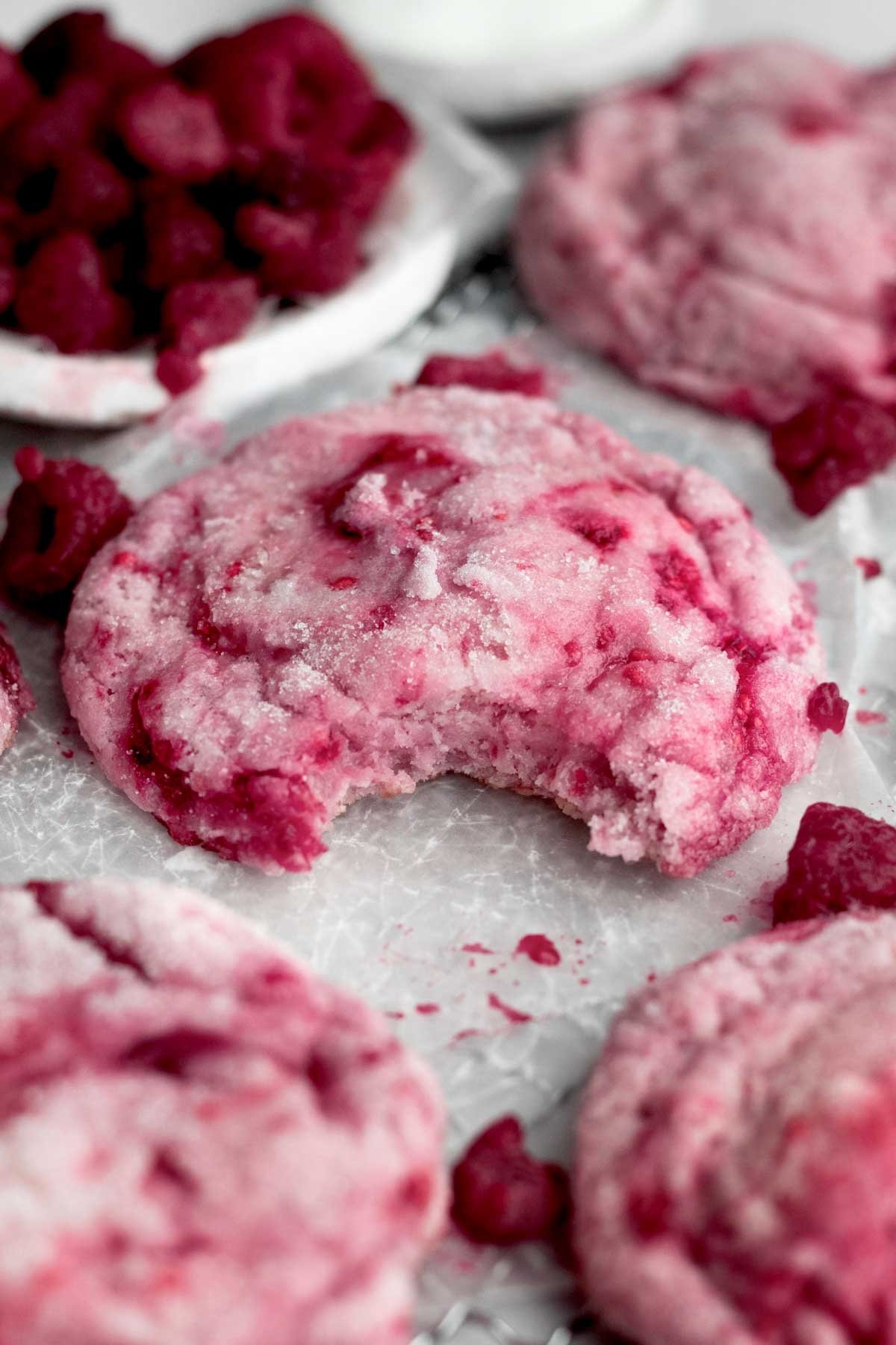 The perfect bite out of this Raspberry Cookie reveals its soft interior guarded by sugar-coated perfection.