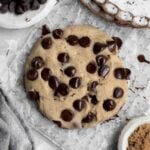 A perfect gluten free Microwave Chocolate Chip Cookie with delicious slightly melted chocolate chips.