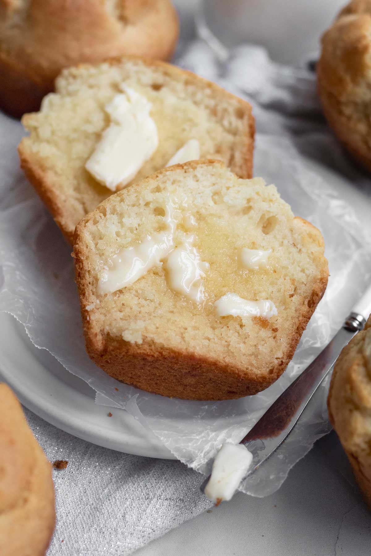 Slices of butter melt on the halves of the Vanilla Muffin activating flavorful excellence.