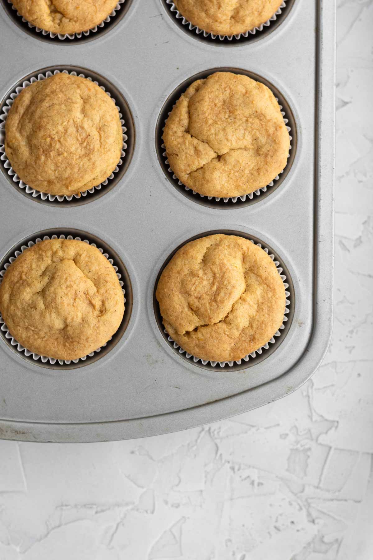 Perfect baked cupcakes fresh from the oven.