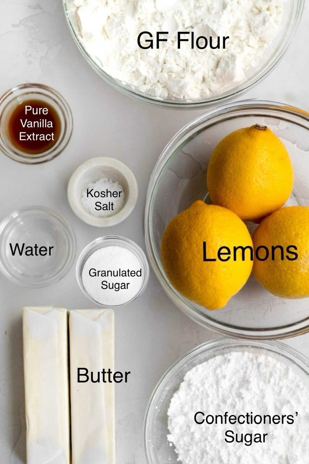 Gluten free flour, pure vanilla extract, kosher salt, lemons, water, granulated sugar, butter and confectioners' sugar in separate containers.