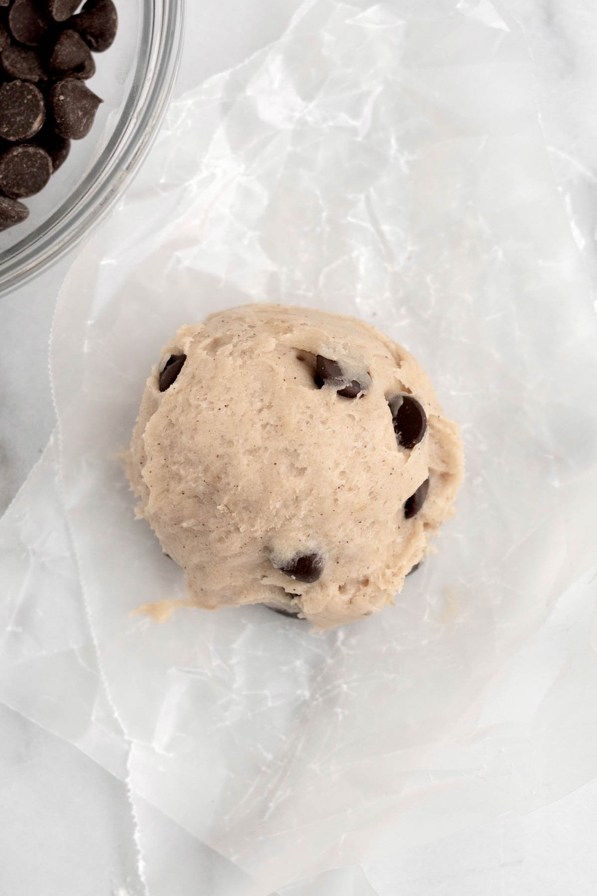 A scooped ball of cookie dough.