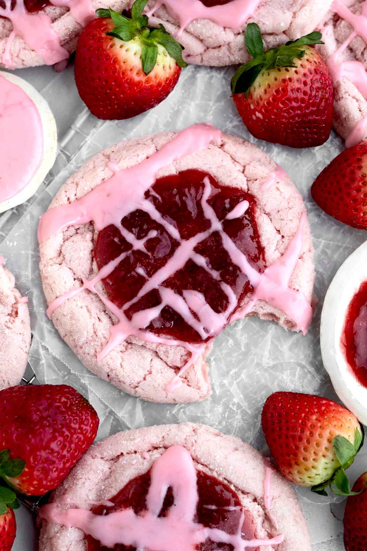 A teasing bite of strawberry bliss is taken from this gluten free Strawberry Jam Cookie.