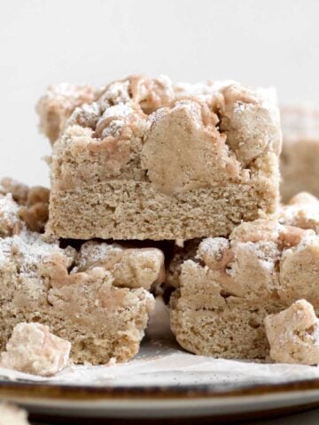 A pyramid stack of three delicious slices of gluten free Applesauce Crumb Cake.