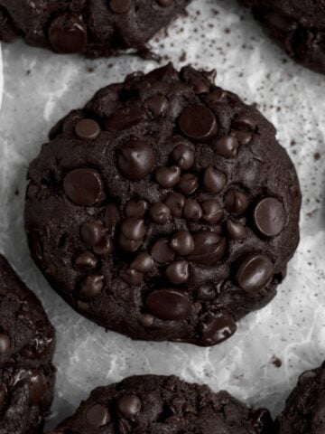 Mini and regular sized chocolate chips adorn the tops of the delicious Triple Chocolate Cookies.