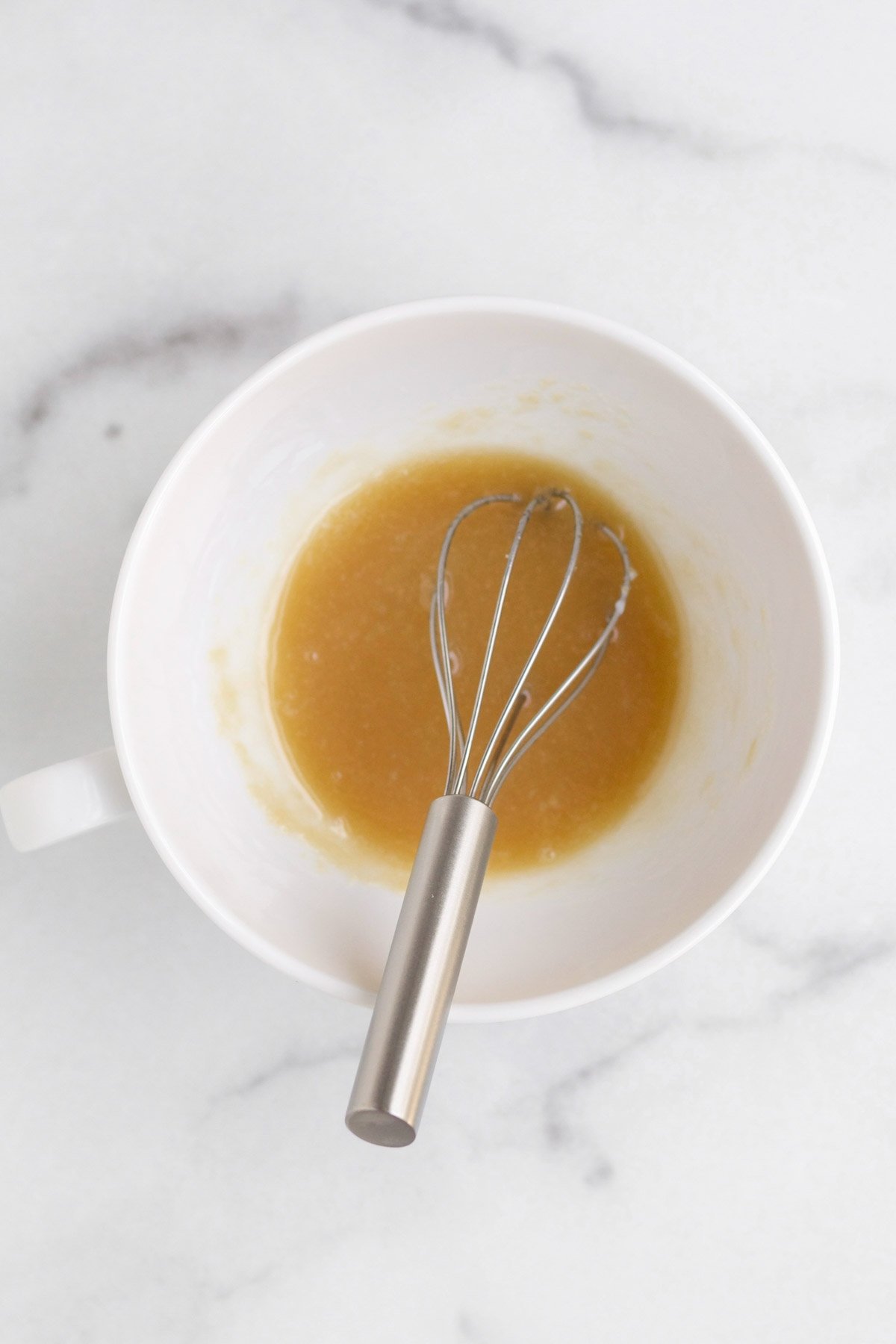 Mixing in delicious brown sugar and the rest of the wet ingredients.