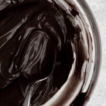 Warm rich decadent chocolate ganache ripples served seductively with a spoon.