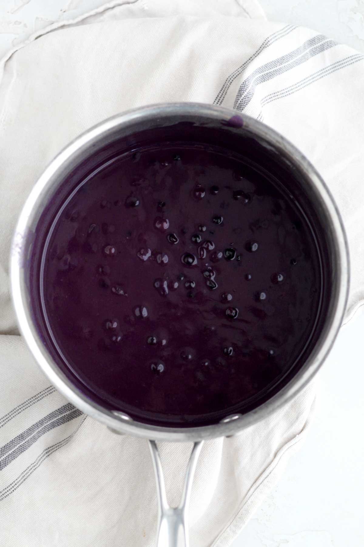 Tossing in some wild blueberries and adding heat.