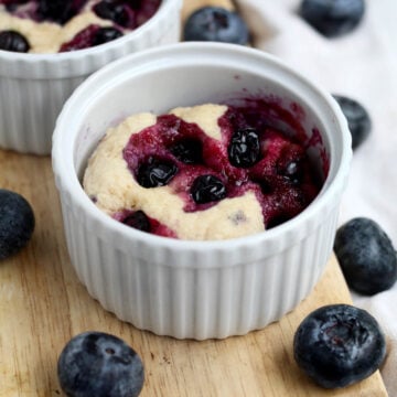 Warm and quick blueberry mug cake ready to be enjoyed.