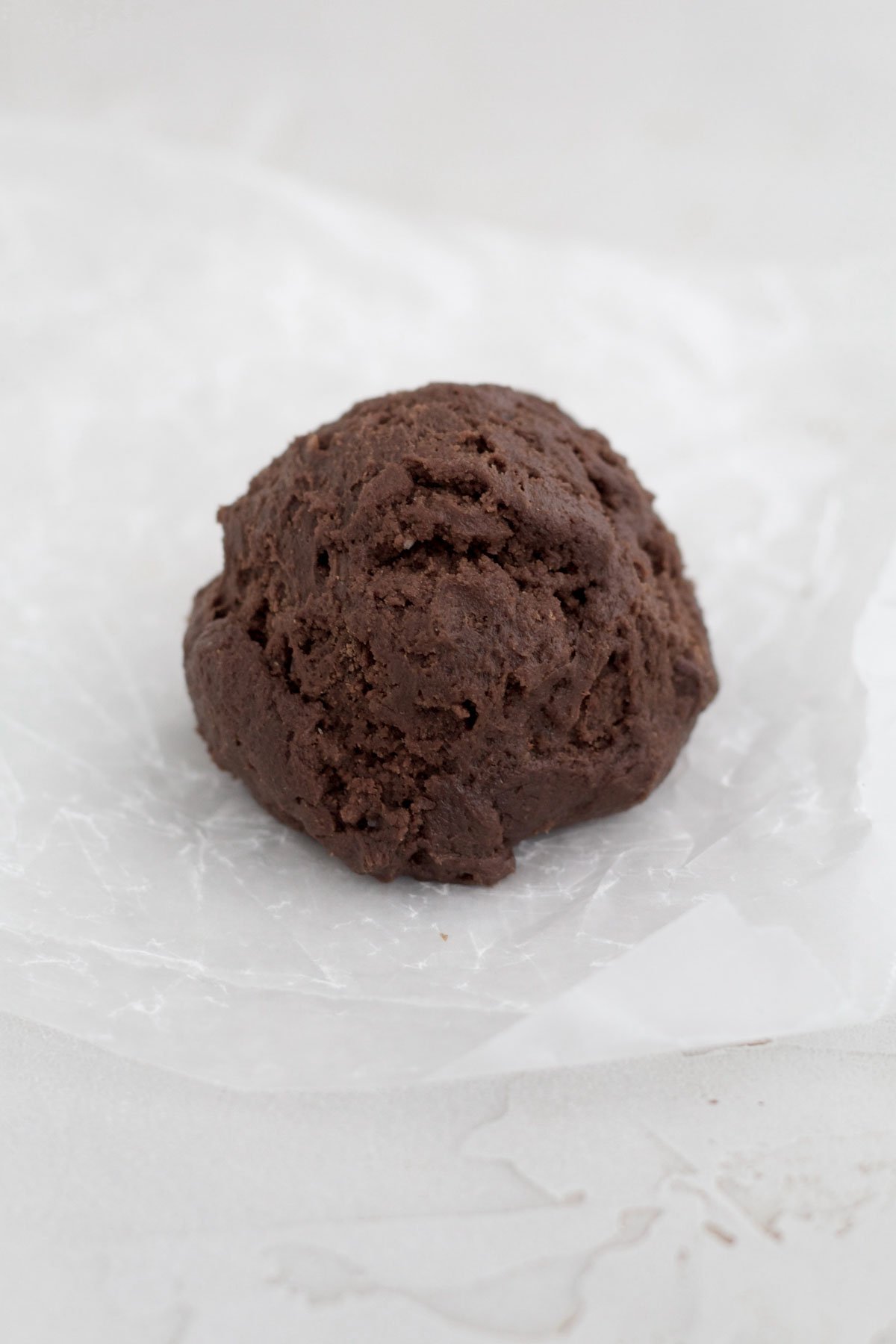 A scooped ball of cookie dough.