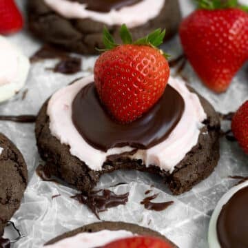 A bite through the sweet layers of ganache, frosting and cookie of the Strawberry Chocolate Cookie.