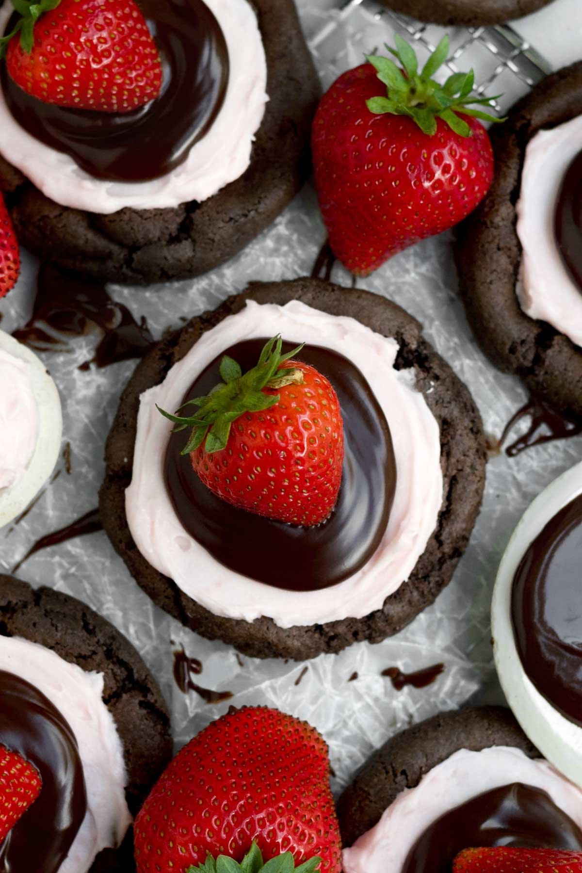 The luscious red strawberry adorns the top of the rich and decadent Strawberry Chocolate Cookie.