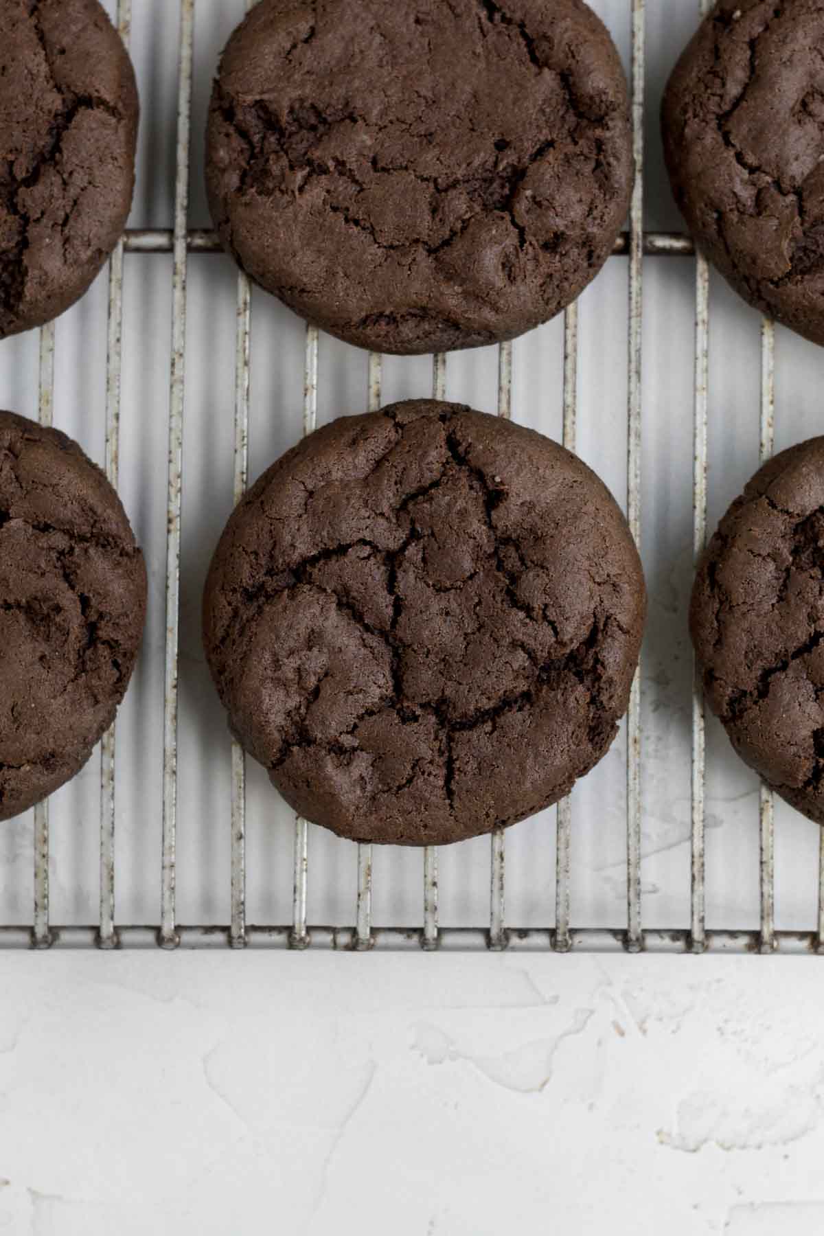 Fresh baked Strawberry Chocolate Cookie bases on a cooling rack.