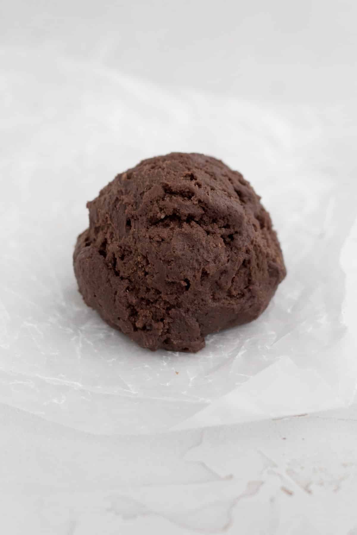A scooped ball of cookie dough.