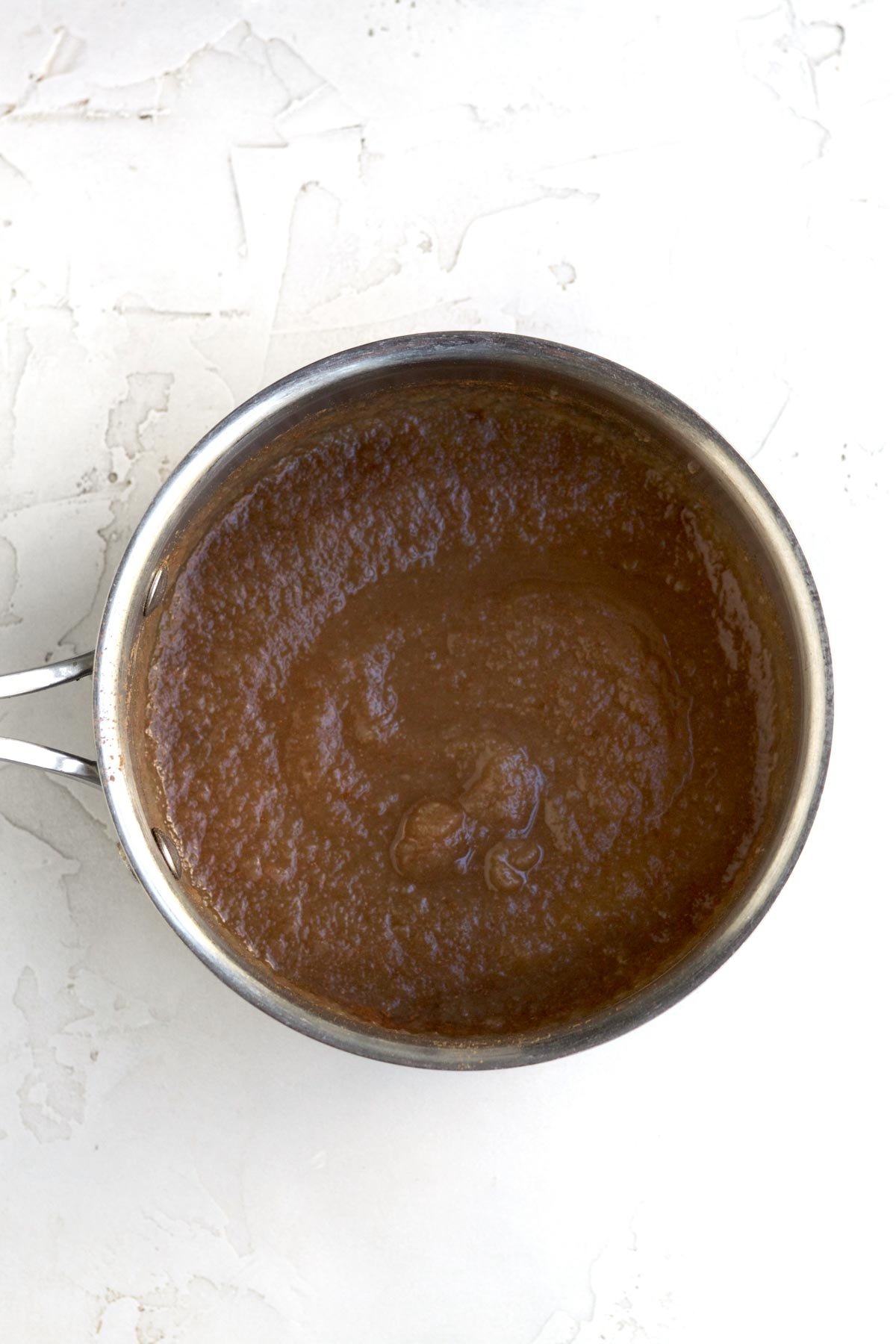 Applesauce, cinnamon, dark brown sugar and salt brought to a boil.
