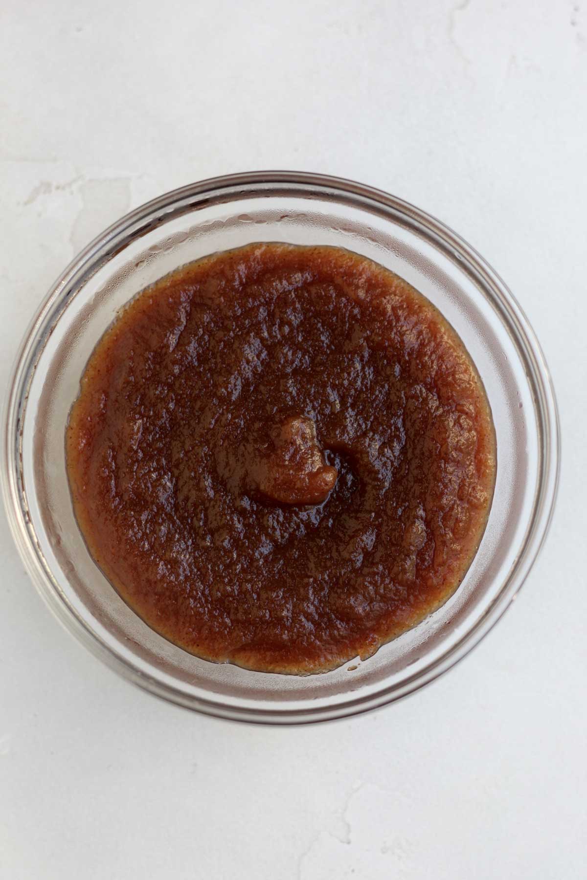 Cooled dark brown apple butter.